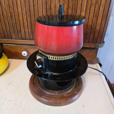 vintage, mid-century modern avocado green fondue pots - orange fondue pot - and a retro General Electric (GE) electric skillet.