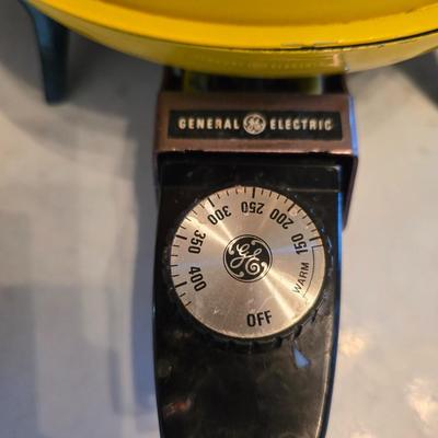 vintage, mid-century modern avocado green fondue pots - orange fondue pot - and a retro General Electric (GE) electric skillet.