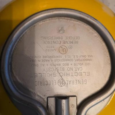 vintage, mid-century modern avocado green fondue pots - orange fondue pot - and a retro General Electric (GE) electric skillet.