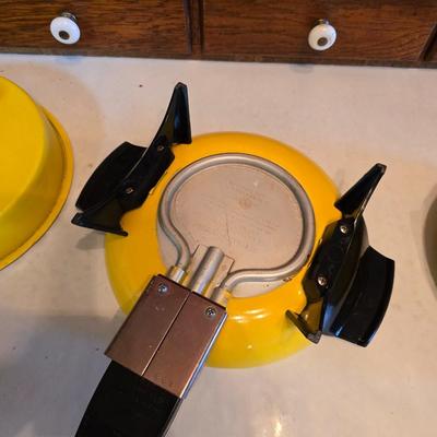 vintage, mid-century modern avocado green fondue pots - orange fondue pot - and a retro General Electric (GE) electric skillet.