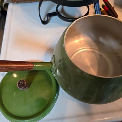 vintage, mid-century modern avocado green fondue pots - orange fondue pot - and a retro General Electric (GE) electric skillet.