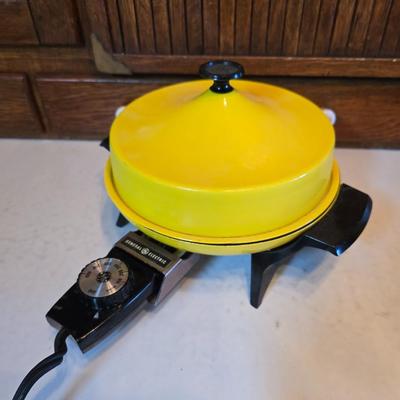 vintage, mid-century modern avocado green fondue pots - orange fondue pot - and a retro General Electric (GE) electric skillet.