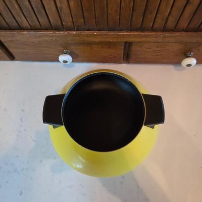 vintage, mid-century modern avocado green fondue pots - orange fondue pot - and a retro General Electric (GE) electric skillet.