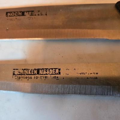 Kitchen knives - including new set of Pioneer branded Chuppa knives - sharpening stone and tools and a cutting board