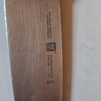 Kitchen knives - including new set of Pioneer branded Chuppa knives - sharpening stone and tools and a cutting board