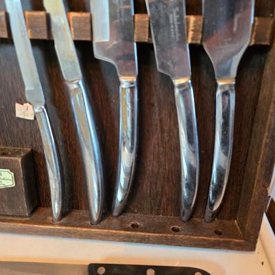 Kitchen knives - including new set of Pioneer branded Chuppa knives - sharpening stone and tools and a cutting board