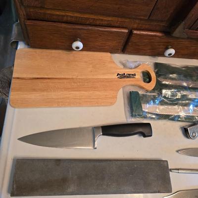 Kitchen knives - including new set of Pioneer branded Chuppa knives - sharpening stone and tools and a cutting board