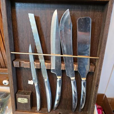 Kitchen knives - including new set of Pioneer branded Chuppa knives - sharpening stone and tools and a cutting board