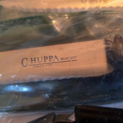 Kitchen knives - including new set of Pioneer branded Chuppa knives - sharpening stone and tools and a cutting board