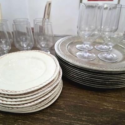 Sale Photo Thumbnail #116: This is a lot including cream colored melamine plates, acrylic silver vintage look chargers, and clear acrylic goblets. This is a lot meaning you must pay for and take the entire lot.