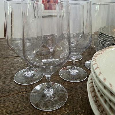 Sale Photo Thumbnail #119: This is a lot including cream colored melamine plates, acrylic silver vintage look chargers, and clear acrylic goblets. This is a lot meaning you must pay for and take the entire lot.