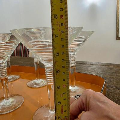 Sale Photo Thumbnail #127: This is a lot including 6 glass martini glasses and 2 trays by Georges Briard Designs. One tray does have some scuffs. Please see pictures for close inspection. The art you may see in the background is NOT included. You are bidding on the lot meaning you 