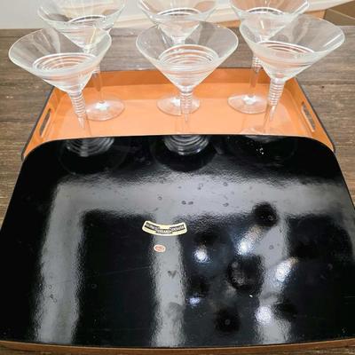 Sale Photo Thumbnail #125: This is a lot including 6 glass martini glasses and 2 trays by Georges Briard Designs. One tray does have some scuffs. Please see pictures for close inspection. The art you may see in the background is NOT included. You are bidding on the lot meaning you 
