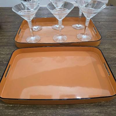 Sale Photo Thumbnail #123: This is a lot including 6 glass martini glasses and 2 trays by Georges Briard Designs. One tray does have some scuffs. Please see pictures for close inspection. The art you may see in the background is NOT included. You are bidding on the lot meaning you 