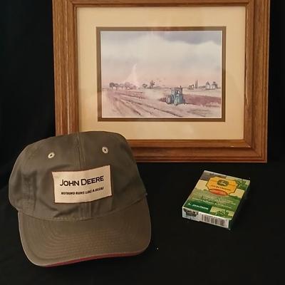 John Deere - Framed signed & numbered tractor scene by Colette McLaughlin 6/460 with John Deere cap and a deck of John deere playing...