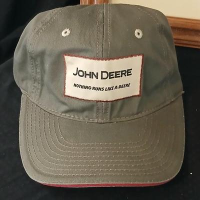 John Deere - Framed signed & numbered tractor scene by Colette McLaughlin 6/460 with John Deere cap and a deck of John deere playing...