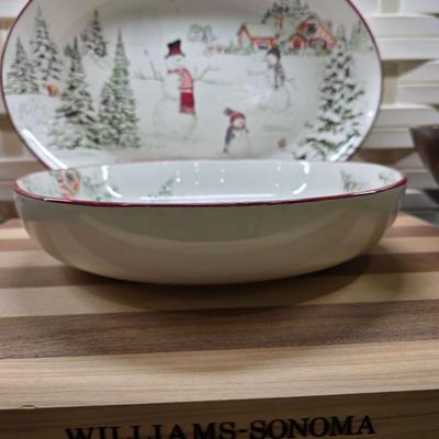 Sale Photo Thumbnail #164: This is a lot including a Williams Sonoma retired Snowman pattern oval platter and serving bowl, a Willams Sonoma cutting board, a light wood bowl, a footed dark wood bowl, and a miscellaneous cutting board. You are bidding on the lot meaning you must pay