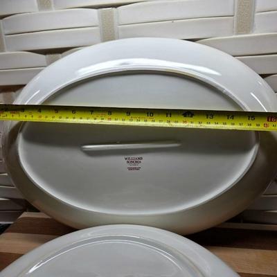 Sale Photo Thumbnail #169: This is a lot including a Williams Sonoma retired Snowman pattern oval platter and serving bowl, a Willams Sonoma cutting board, a light wood bowl, a footed dark wood bowl, and a miscellaneous cutting board. You are bidding on the lot meaning you must pay