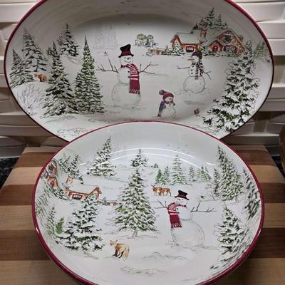 Sale Photo Thumbnail #165: This is a lot including a Williams Sonoma retired Snowman pattern oval platter and serving bowl, a Willams Sonoma cutting board, a light wood bowl, a footed dark wood bowl, and a miscellaneous cutting board. You are bidding on the lot meaning you must pay