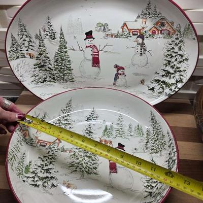 Sale Photo Thumbnail #170: This is a lot including a Williams Sonoma retired Snowman pattern oval platter and serving bowl, a Willams Sonoma cutting board, a light wood bowl, a footed dark wood bowl, and a miscellaneous cutting board. You are bidding on the lot meaning you must pay