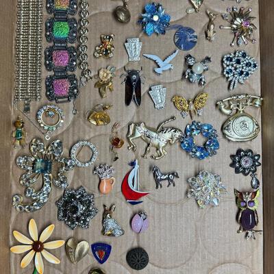 Sale Photo Thumbnail #365: Includes vintage belt buckles, pins, bracelets, a trinket box, and more. Total of 100+ pieces. Some pieces have age related wear. [RM]