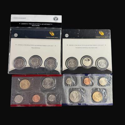 Sale Photo Thumbnail #407: **WIRE TRANSFER IS REQUIRED IF SHIPPED.** Includes a 2010 Yellowstone Quarter Set, a 2011 Vicksburg Quarter Set, and 2006 P&D sets. Total of four sets. **ALL PRECIOUS METALS SALES ARE FINAL. NO REFUNDS WILL BE GIVEN FOR ANY REASON.** [SP]