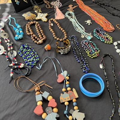 Sale Photo Thumbnail #39: Boho and beaded necklaces 
Lia sophia tortoise shell bracelet