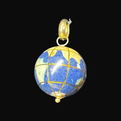 Sale Photo Thumbnail #446: **WIRE TRANSFER IS REQUIRED IF SHIPPED.** This lapis lazuli globe charm has 18K gold accents and findings. Measurement: 1”L (approximate). Gold content confirmed using Niton XRF precious metals analyzer. **ALL PRECIOUS METALS SALES ARE FINAL. NO REFUNDS
