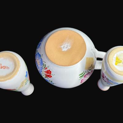 Sale Photo Thumbnail #460: Hand painted. Some pieces have “Chodovia” paper labels. Includes baskets, candle holders, bud vases, pitcher, and more. Total of ten pieces. Measurement of largest: 5”H. [RE]