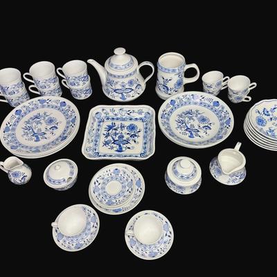 Sale Photo Thumbnail #464: Includes coffee pot, creamers, sugar bowls, plates, bowls, serving tray, and more. Total of 40+ pieces from various manufacturers. One cup has a chip. [RE]