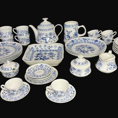 Sale Photo Thumbnail #463: Includes coffee pot, creamers, sugar bowls, plates, bowls, serving tray, and more. Total of 40+ pieces from various manufacturers. One cup has a chip. [RE]