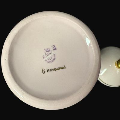 Sale Photo Thumbnail #482: Includes a compote, a trinket dish, an ashtray, and more. Total of seven pieces from various makers, including H&C. Pre-auction estimate: $100-$150. [RE]