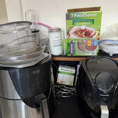 Sale Photo Thumbnail #107: 2 Air  Fryers, magic Bullet , Coffee Grinder, rice cooker, mini fry daddy, food saver accessories.
