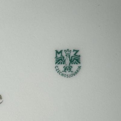 Sale Photo Thumbnail #495: Makers include Czecho, Moritz Zoekaver (x2), and Epiag. Total of four pieces. Measurement of largest: 10” Diameter. Pre-auction estimate: $50-$100. [RE]