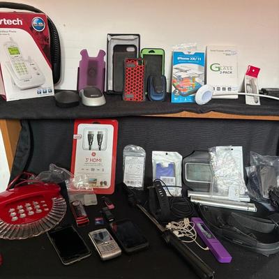 Sale Photo Thumbnail #124: Phones, cases, computer men’s fitbit and more.