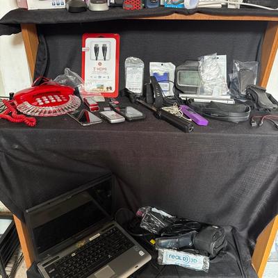 Sale Photo Thumbnail #121: Phones, cases, computer men’s fitbit and more.