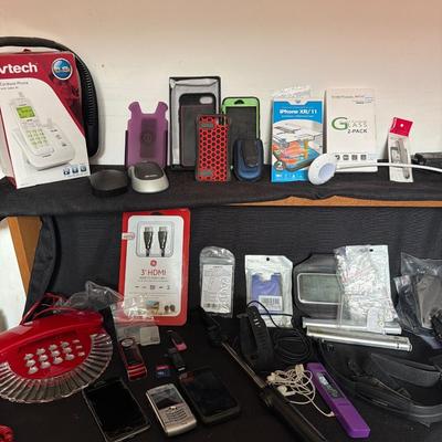 Sale Photo Thumbnail #123: Phones, cases, computer men’s fitbit and more.
