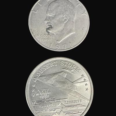 Sale Photo Thumbnail #524: Includes three infant spoons, a bottle opener, a 1971 Eisenhower dollar, and a Desert Storm coin. [RM]