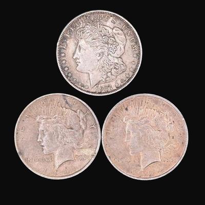 Sale Photo Thumbnail #528: **WIRE TRANSFER IS REQUIRED IF SHIPPED.** Includes a 1921 Morgan dollar, two 1924 Peace dollars, and a 1982 George Washington commemorative half dollar. Silver content is 90%. **ALL PRECIOUS METALS SALES ARE FINAL. NO REFUNDS WILL BE GIVEN FOR ANY REASON.