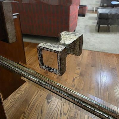 Sale Photo Thumbnail #203: This elegant, mirrored buffet/credenza cabinet is stunning and functional with lots of storage space. It measures 67"L x 34.5" H x 20"D. The cabinet is the only item you're bidding on, any other furniture or art you see in the photograph is NOT included.