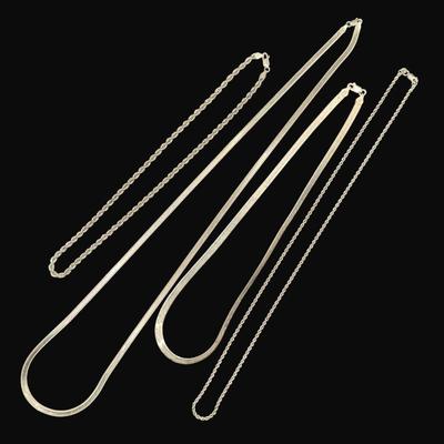 Sale Photo Thumbnail #541: **WIRE TRANSFER IS REQUIRED IF SHIPPED.** [60.0g] Includes two herringbone chains and two twisted rope chains. Age related wear, but no repairs are needed. **ALL PRECIOUS METALS SALES ARE FINAL. NO REFUNDS WILL BE GIVEN FOR ANY REASON.** [AG]