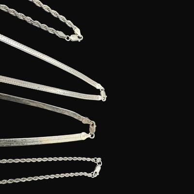 Sale Photo Thumbnail #542: **WIRE TRANSFER IS REQUIRED IF SHIPPED.** [60.0g] Includes two herringbone chains and two twisted rope chains. Age related wear, but no repairs are needed. **ALL PRECIOUS METALS SALES ARE FINAL. NO REFUNDS WILL BE GIVEN FOR ANY REASON.** [AG]