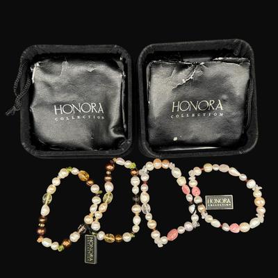 Sale Photo Thumbnail #547: Includes a bracelet with Baroque pearls and rhodonite, and a bracelet with Baroque pearls, colored pearls, and semi-precious stones. Includes original boxes and bags. [AG]