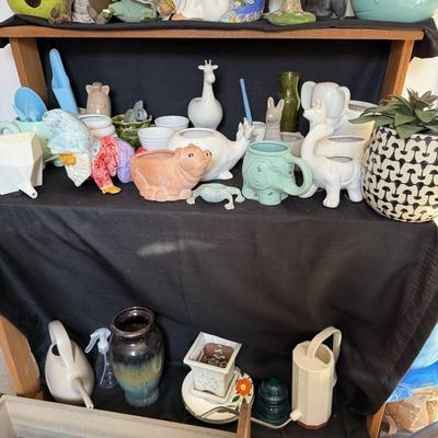 Sale Photo Thumbnail #172: Small planting Pots and water Cans

Wooden Flower Planter with hearts not included.