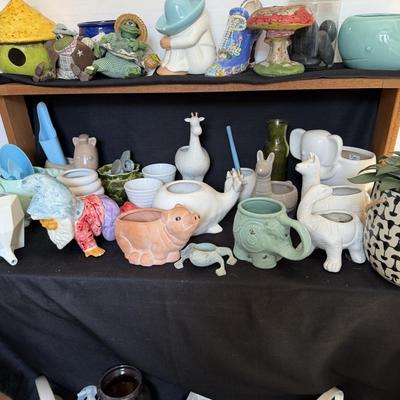 Sale Photo Thumbnail #173: Small planting Pots and water Cans

Wooden Flower Planter with hearts not included.