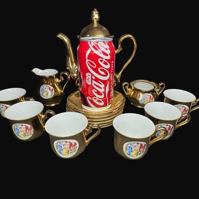 Sale Photo Thumbnail #554: Service for six. Includes a tea pot, creamer, sugar (no lid), cups, and saucers. [RE]