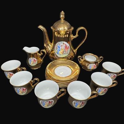 Sale Photo Thumbnail #553: Service for six. Includes a tea pot, creamer, sugar (no lid), cups, and saucers. [RE]