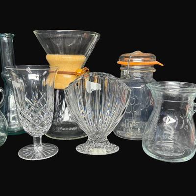 Sale Photo Thumbnail #573: Includes a Chemex pour over coffee maker, an Italian glass bottle, a medium pitcher, Waterford Marquis, and more. Total of seven pieces. Measurement of tallest: 9”H. [CS]
