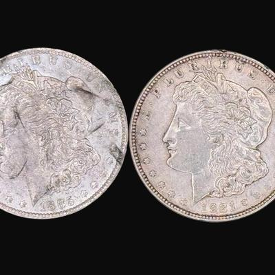 Sale Photo Thumbnail #590: **WIRE TRANSFER IS REQUIRED IF SHIPPED.** Includes an 1885-O (New Orleans), and a 1921 Philadelphia. Both are believed to be almost uncirculated. Silver content is 90%, **ALL PRECIOUS METALS SALES ARE FINAL. NO REFUNDS WILL BE GIVEN FOR ANY REASON.** [AG]