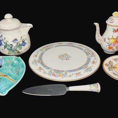Sale Photo Thumbnail #602: Includes a Royal Worcester cake plate and server, Buckingham Palace English china, Herend Hungary hand painted coffee pot, and a Villeroy & Boch porcelain tea pot. Total of six pieces. Measurement of largest: 11” Diameter. [CS]